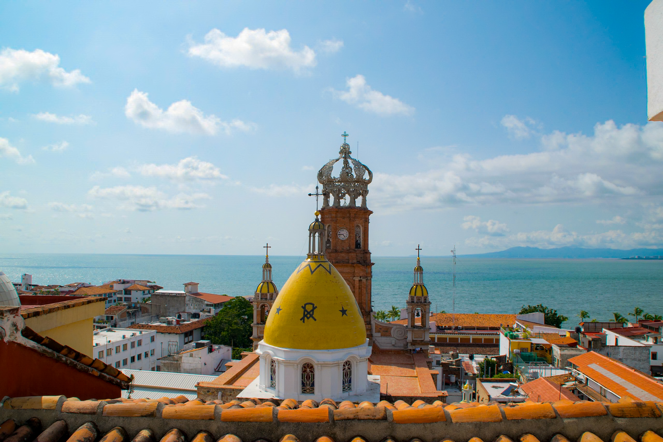 Scenic coastal town in Mexico with a colonial church and ocean view—perfect for destination MICE events blending heritage and hospitality.
